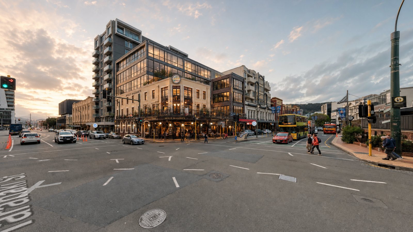 134 Courtenay Place reimagined: restored heritage frontages, warm street-level life at golden hour